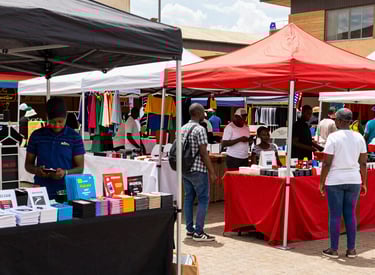 A lively event entrance bustling with attendees eagerly entering.