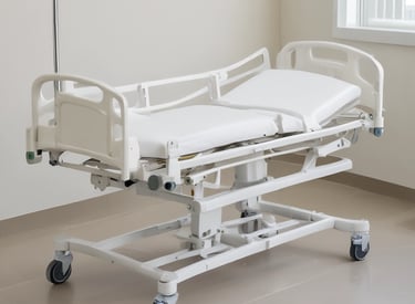 A clean, well-organized hospital room featuring modern hospital beds and furniture.