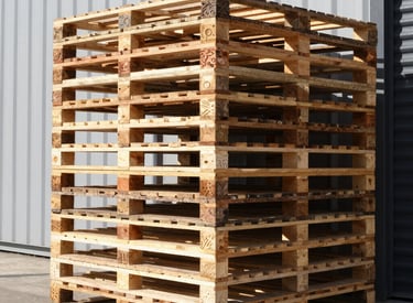 A CycleLift team member loading pallets into a truck on a busy loading dock.