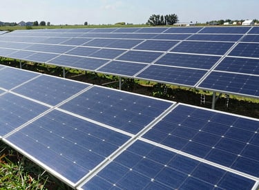 Solar panels integrated with AI monitoring systems under a clear blue sky.