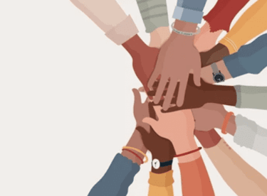 different people holding hands together in a circle