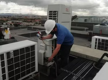 a man in a white helmet and a white helmet on a roof