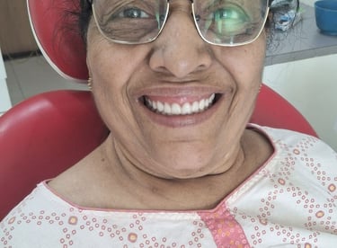Corrected bite and balanced teeth after full mouth rehabilitation at Shree Dental Care