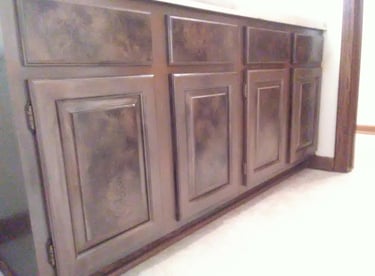 Custom painted faux marble bathroom cabinets and drawers