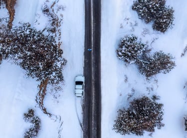 a car driving down a snowy road. arbab naimat kasi , balochistan , ziarat , award
