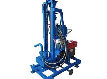 Portable blue hydraulic water well drilling rig with a diesel engine on a white background.