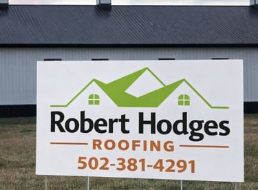 Robert Hodges Roofing yard sign displayed at a completed roofing project in Louisville KY