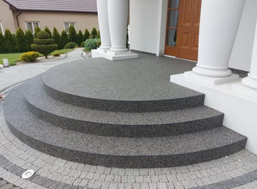 a large set of stairs leading up to a house