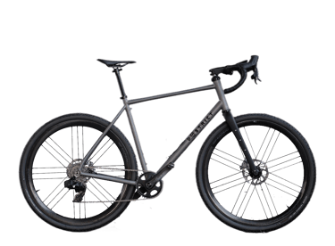 Custom grey gravel bike with carbon wheels and disc brakes Dystrict Titanium.