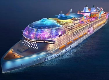 a cruise ship with a large cruise ship in the water