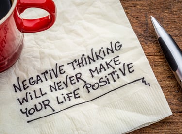 a napkin with a notepad and pen on a napkin