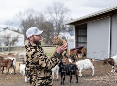 Joel Kasak with animals