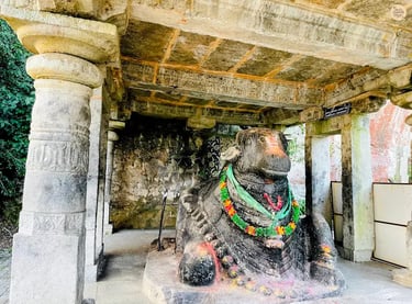 Monolithic Nandi statue at Yoga Nandeeshwara Temple, Nandi Hills, carved from a single piece of stone & facing the temple