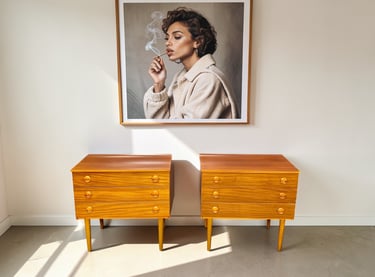 Pair of Schreiber Mid Century bedside tables in teak with retro vintage design and practical bedroom storage.