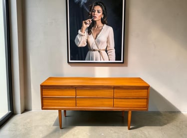 Austin Suite vintage teak sideboard in Mid Century Modern style with spacious cupboard and drawer storage.