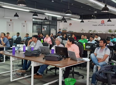 a man standing in front of a room full of people