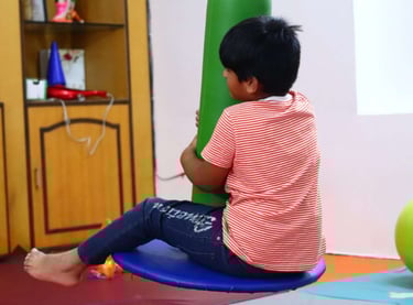 Kid undergoing Occupational Therapy for sensory balancing