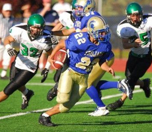 a football player running with a football ball