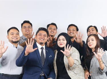 a group of people standing around a man in a suit