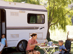 family camping by lake
