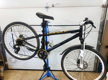 a bicycle that is sitting on a stand