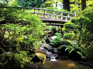 Portland, OR - The Japanese Garden's footbridge and gentle flowing creek are soothing