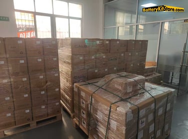 pallets of prismatic LiFePO4 battery cells in packages