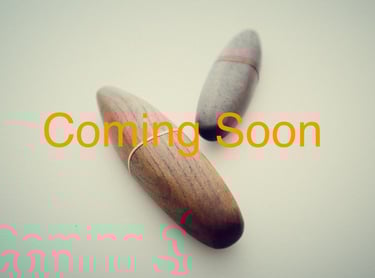 Two smooth wooden palm knives with on white background