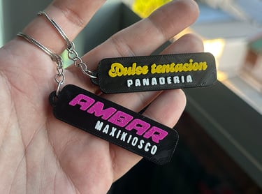 Custom 3D printed business keychains for Dulce Tentacion panaderia and Ambar maxikiosco.