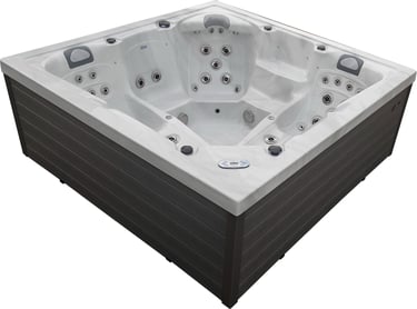 a hot tub with a white tub and a black and white tub