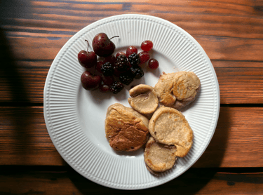 mini oats pancakes with cherry, blackberry and grapes