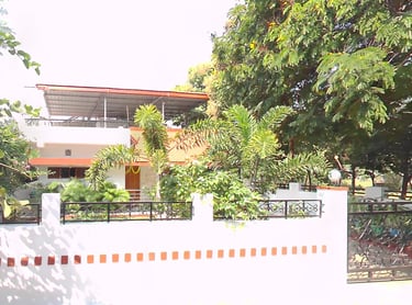 Indira House