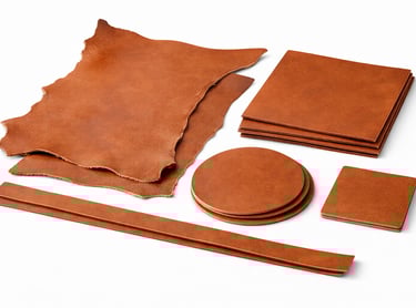 Leather pieces in sheets, panels, and custom cuts.