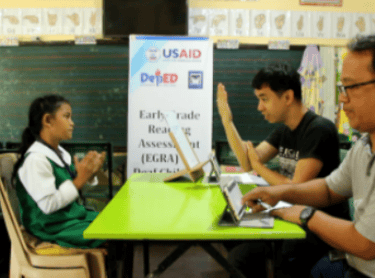 a man and a woman sitting at a table