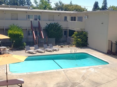 pool and patio at university commons apartments davis california
