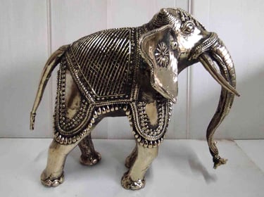 "Handcrafted brass elephant with artistic tribal design, right view-for overseas markets"