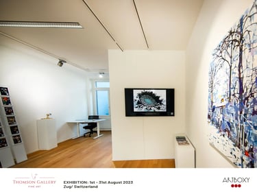 Digital screen with image of digitally manipulated sunflower on it in an art gallery. 