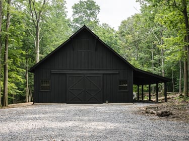 Exterior wooden barn painted black with breathable matte natural paint