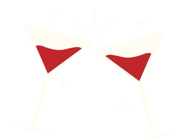 Deux verres à martini remplis de cocktails rouges qui s’entrechoquent lors d’un toast festif, avec d
