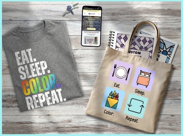 cream tee with phrase "EAT.SLEEP.COLOR.REPEAT." and tote bag with icons representing each of those