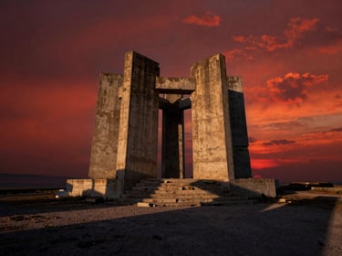 Atmospheric wide panoramic shot of an abandoned concrete monument in North Macedonia at sunset, harsh shadows, rich red and amber tones