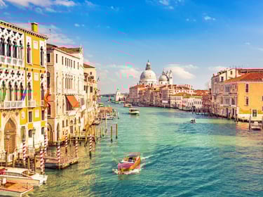 A relaxing morning overlooking the Grand Canal and admiring the boats in Venice, Italy