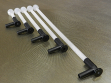 retainer, an air spray nozzle is inserted