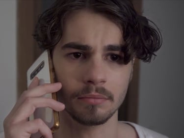 a man with a phone phone in his hand