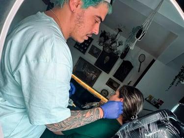 Rodolfo doing a piercing at Tattoo and body piercing studio in Vagos, Aveiro.