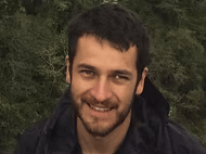 Chiapas birding guide Valente Gonzalez smiling to the camera in front of a jungle background
