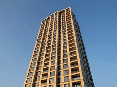 Low-angle architectural exterior of M3M Golf Estate, Gurugram, modern high-rise, golden hour sunlight, deep blue and warm gold tones, wide-angle, luxury architectural photography, 35mm