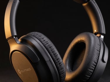 Close-up product thumbnail of wireless noise-cancelling headphones on near-black background, amber accent rim light on left edge