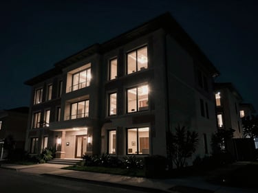 Cinematic shot of a luxury real estate property, dramatic lighting, wide angle, 16:9 aspect ratio, deep shadows, anamorphic lens flares