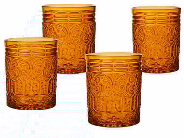 Four amber colored glasses with textured designs all over